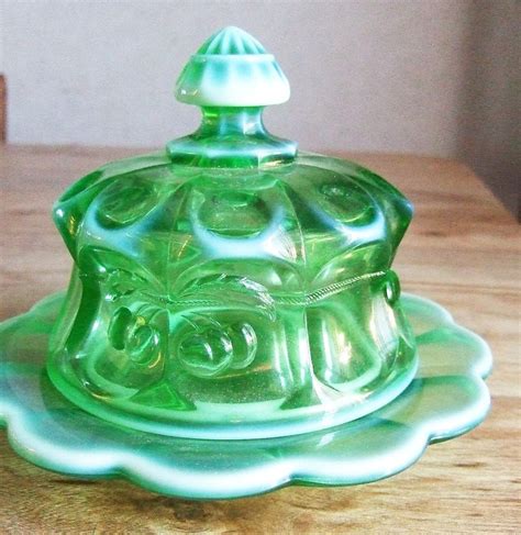 Go for a classic french dish , a rustic butter crock , or a retro jadeite option to compliment your serveware collection. Green Opalescent Butter Dish Cherries and Cable Vintage ...