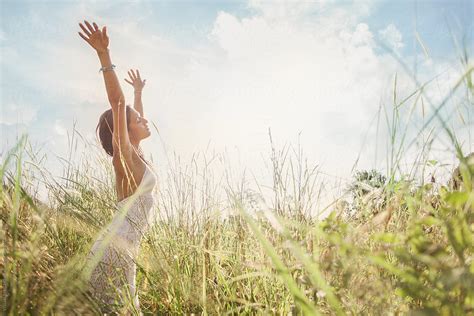 Young Woman Dancing In Nature By Visualspectrum Stocksy United