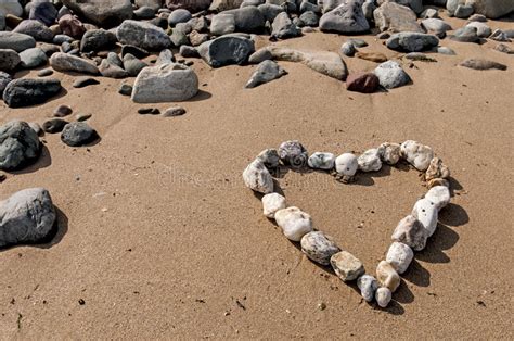 Pebble Love Heart On Beach Stock Photo Image Of Love 77485308