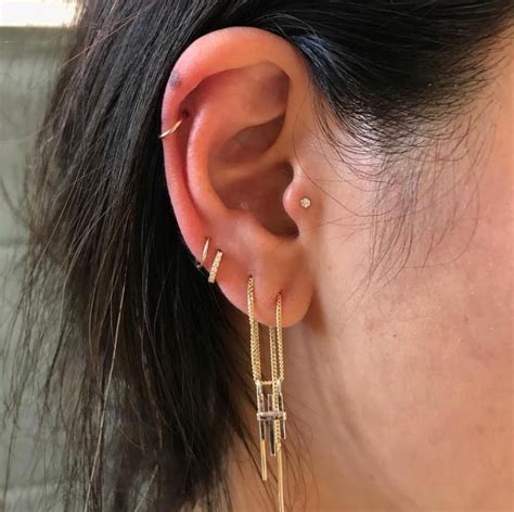 Tragus Piercing Your Guide To The Pain Healing Time And Cost Allure