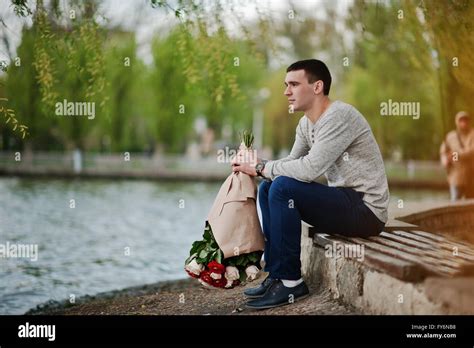 Man With A Bouquet Of Flowers Waiting For His Girlfriend Declaration