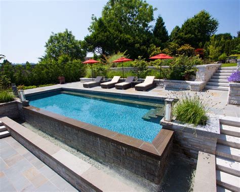 Landscaping Pool Slope Traditional With Stone Pool Slightly Sloped Yard Ideas Above Ground