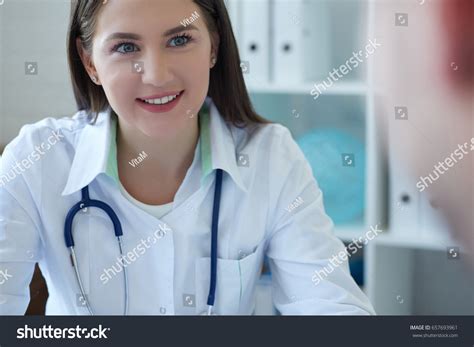 Female Doctor Giving Consultation Patient Explaining Stock Photo