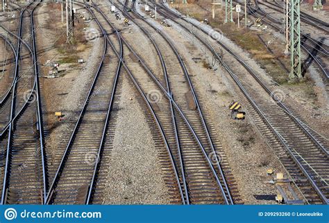 Many Train Tracks With Switches Are Photographed From Above On A