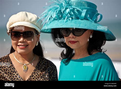Two Mature And Elegant Asian Women Wearing Sunglasses And Sun Hats Thailand S E Asia Stock