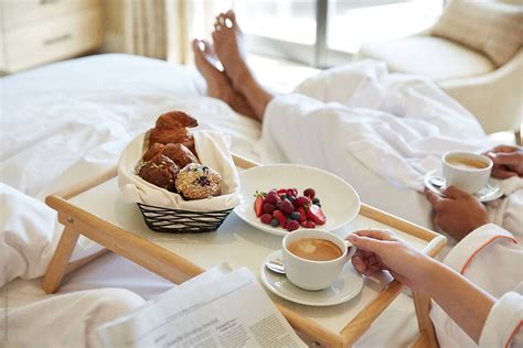 Couple Having Breakfast In Bed By Stocksy Contributor Trinette Reed