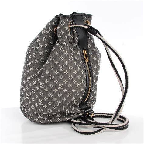 I have noticed at not all the palm spring mini monogram canvas color look the same. LOUIS VUITTON Mini Lin Monogram Betsy Backpack Black 116293