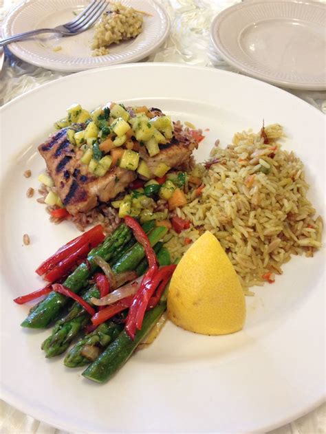 3 Entree Ginger Miso Grilled Sea Bass With Mango Salsa Atop A Bed Of Faro Side Of Rice Pilaf