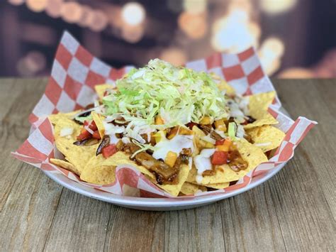 We distribute food throughout the upper midwest. Smoked BBQ Brisket Nachos | Upper Lakes Foods