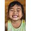 Kid Smiling By Chalit Saphaphak  Stocksy United
