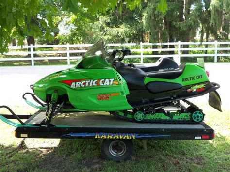 Handlebar risers will put your bars right. 2 Arctic Cat Snowmobiles and Trailer for sale ...
