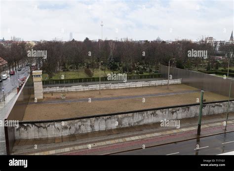 Remains Of The Berlin Wall And Watchtower At The Berlin Wall Memorial