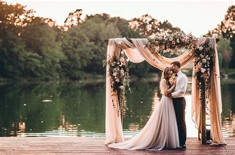 Beautiful Simplicity Wedding Arch With Fabric Draping