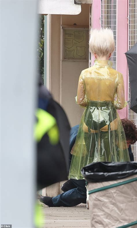 Maisie Williams Goes Topless Beneath Clear Pvc Coat As She Transforms