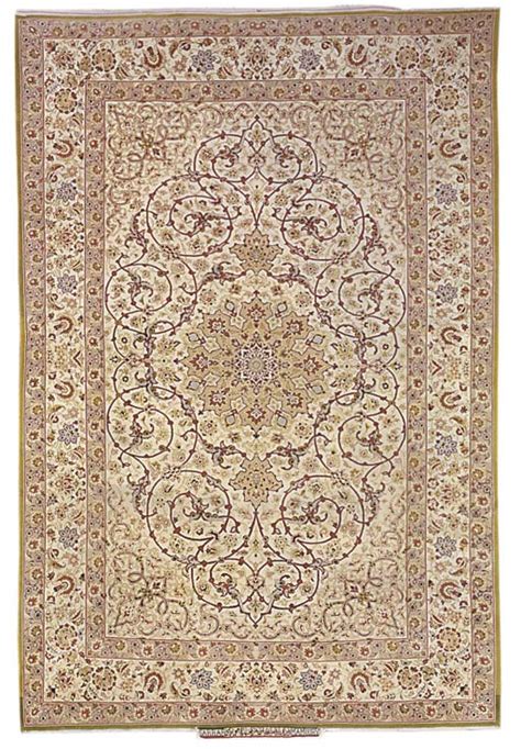 AN ISFAHAN CARPET , SIGNED SARRAF MAMOURY, CENTRAL PERSIA ...