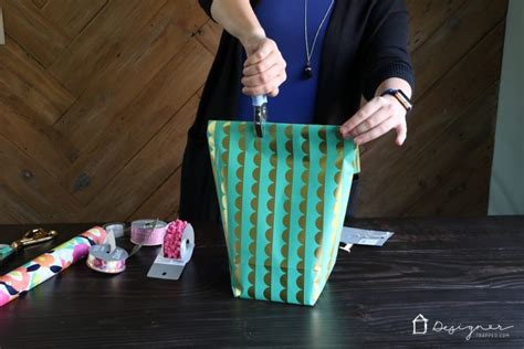 Those who aren't stoked about this simply let someone else do it for them but those who don't know how to tie a bow with ribbon? How to Make a Gift Bag from Wrapping Paper ...