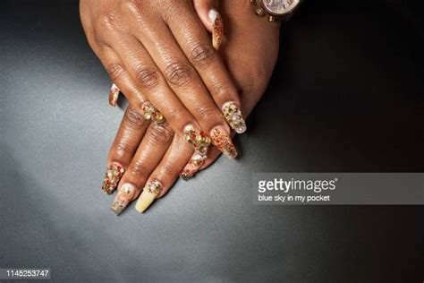 Black Woman Painting Her Nails Photos And Premium High Res Pictures
