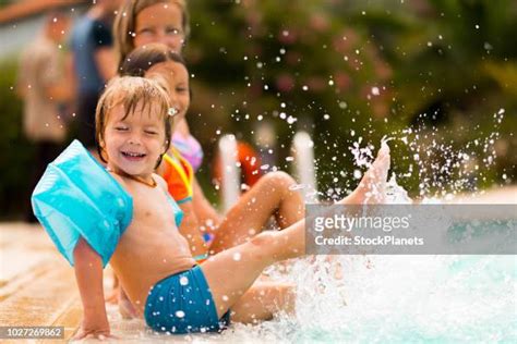 Kids Splashing Pool Photos And Premium High Res Pictures Getty Images