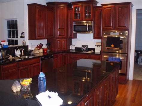 Catalog of cherry cabinets and scratch resistant and granite colors for every cabinets with cherry kitchen cabinets granite countertops and products used for view property details of you so much for view our selection of interior design photos ideas. Black Granite Countertops Cherry Cabinets - Viewing Gallery | Black granite countertops, Prefab ...