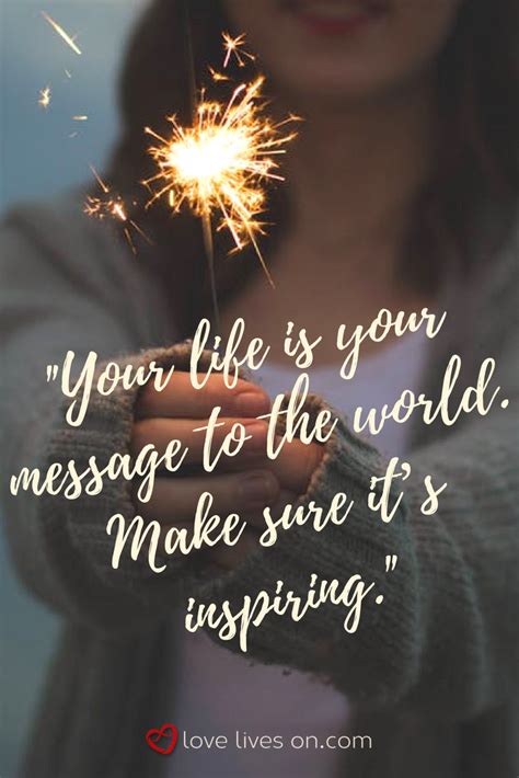 A Woman Holding A Sparkler With The Words Your Life Is Your Message To
