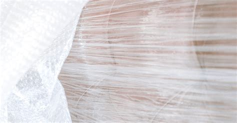 Sofa Wrapped In Plastic · Free Stock Photo