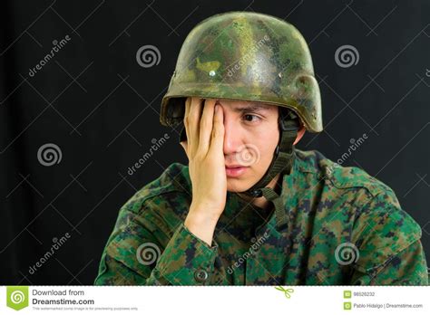 Handsome Sad Young Soldier Wearing Uniform Suffering From Stress With