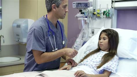 Young Girl Talking To Male Nurse In Hospital Room Stock Footage Video Of Occupation Care