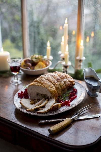 How to prep the rolled up turkey roulade for slow roasting in the oven. Donal Skehan | Roast Rolled Turkey Breast with Cranberry & Sage Stuffing