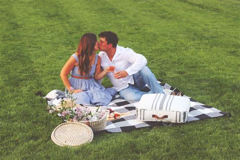 Kissing Couple Backyard Picnic For Date Night Romantic Date Night Ideas
