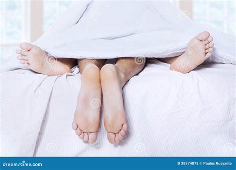 Pairs Of Feet In A Bed Stock Photo Image 38874873