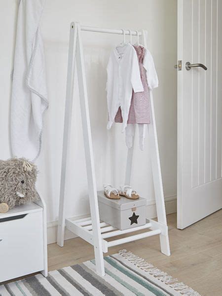 The sensible and orderly side that wants everything is organized and the extravagant and exhibitionist side that loves their stuff wherever they can be seen. Timeless and stylish, this lovely wooden clothes rail has ...