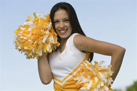 Beautiful Cheerleader Holding Pom Poms Stock Image Image Of Adult Beautiful 29645309