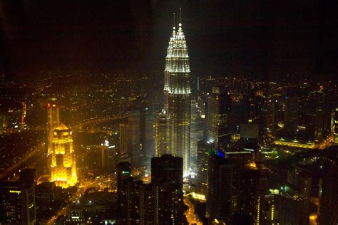 Trendy bistros, hip clubs, street markets, concerts and jazz nights, there's something for everyone in kuala lumpur. Above the roofs of Kuala Lumpur - the KL Tower at night