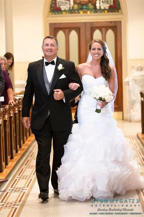 Here's 25 wedding aisle songs to walk down the aisle to. How gorgeous is this bride walking down the aisle with her ...