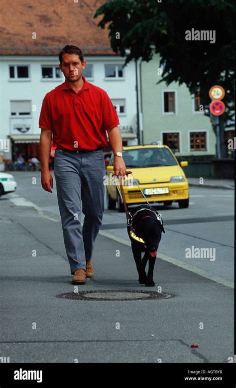 Blind Man Walking High Resolution Stock Photography And Images Alamy