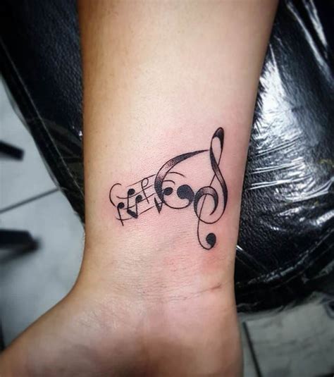 20 Modèles Pour Les Amoureux De La Musique Wrist Tattoos For Women