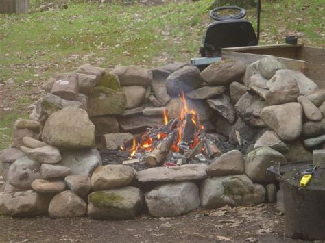 Pin By Chasity Ross On Cabins Fire Pit Bbq Fire Pit With Rocks Fire
