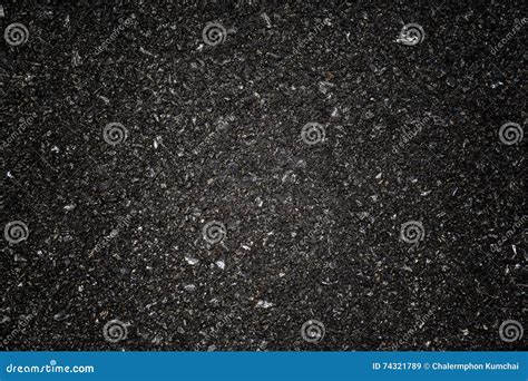 Smooth Dark Grey Asphalt Pavement Texture With Small Rocks Stock Image