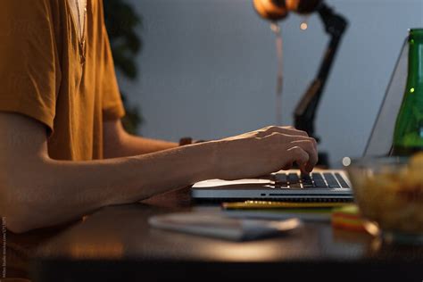 Crop Man Typing On Laptop By Stocksy Contributor Milles Studio