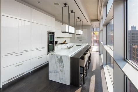 Kim kardashian shows us the inside of her multiple fridges and her kitchen. Kim Kardashian's Home Away from Home | DesignRulz