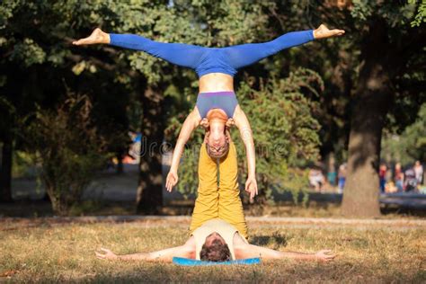 Acro Yoga Couple Practising Shoulder Stand Pose Stock Photo Image Of