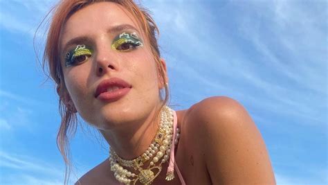 Bella Thorne Flashes Big Beautiful Eyes And Sticks Out Her Tongue For