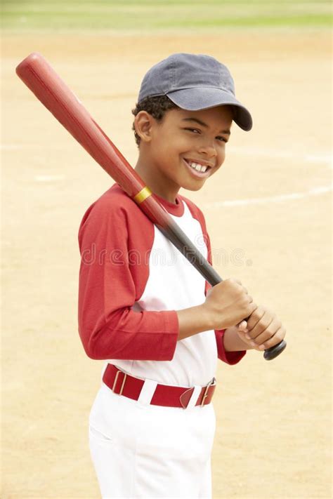 Young Boy Playing Baseball Young African American Boy Playing Baseball