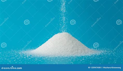 Heap Of Sugar With Pouring On Blue Background Stock Photo Image Of