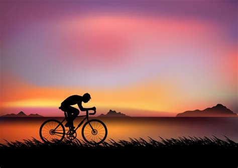 A Man Riding A Bicycle In The Evening With Light Of Sunset And Orange