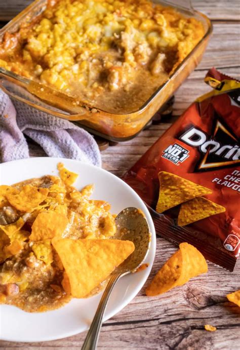 Top with the chicken mixture. Nacho Cheese Dorito Chicken Casserole - Recipe Magik