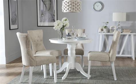 Partnering this table with the monti real leather dining chairs and arm chairs will give your dining set a cool elegance, which looks great for dinner parties and social gatherings. Kingston Round White Dining Table - with 4 Bewley Oatmeal ...