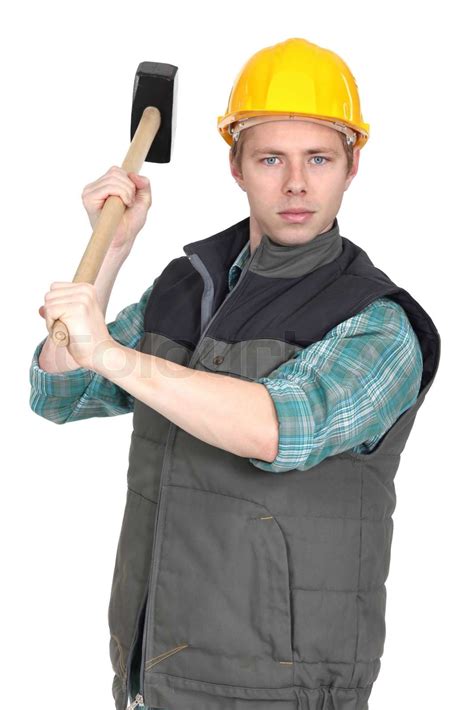 worker with a sledgehammer stock image colourbox