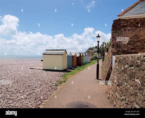 A Row Of Colourful Beach Huts On Beach At Budleigh Salterton Stock Photo Alamy