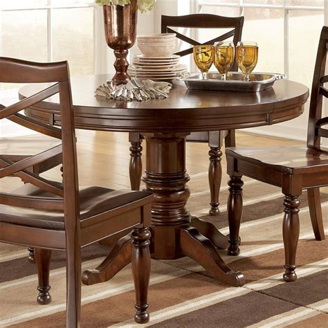 Well you're in luck, because here they come. Porter Round/ Oval Dining Table Signature Design by Ashley ...